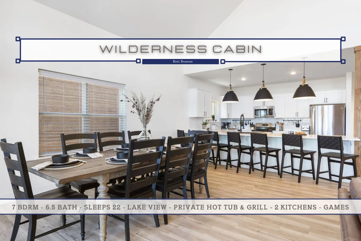 An inviting interior scene with a large dining table, a kitchen island, and a picturesque window showcasing the lake view, creating a seamless connection between cooking, dining, and the outdoors.